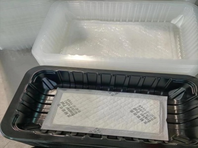 生鲜托盘整理放置吸水垫全自动落盒机